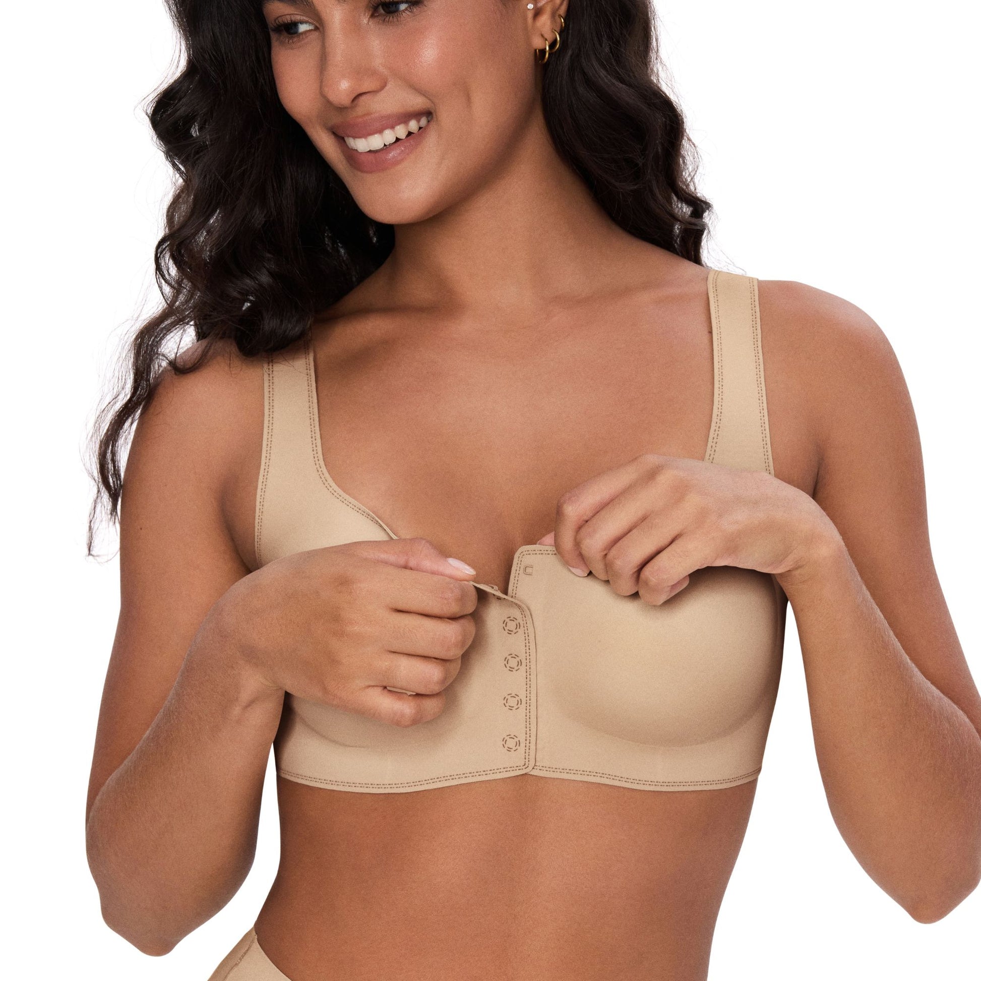 UBRAS Front Closure Bra in beige. Model unfastens clasp, smiling. Soft cups and wide straps for daily all-day comfort.