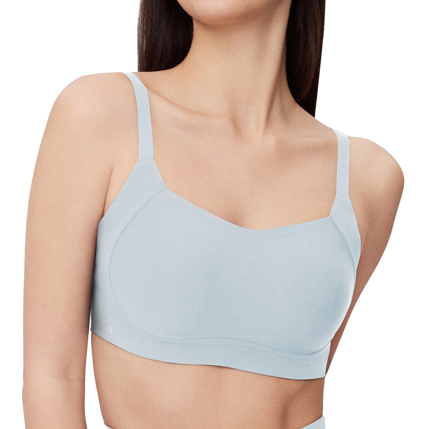 A woman wears the Side Support Back-Hook Bra in Blue by UBRAS